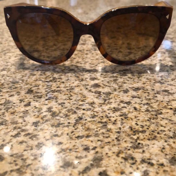 Tortoise Prada polarized sunglasses. main image 7